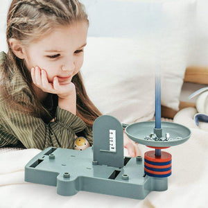 Child using magnetic science experiment kit with levitation and physics components
