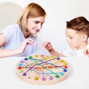 Mother and child playing educational wooden Rope Untying Challenge Game for kids development and coordination