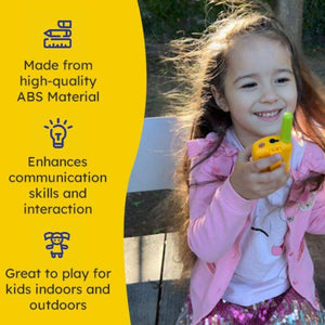 Child using yellow kids walkie talkie outdoors, promoting communication skills and indoor-outdoor play with high-quality ABS material.