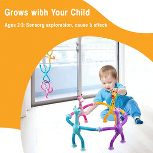 Toddler playing with colorful giraffe toys from screen-free busy bag for sensory exploration and cause-effect learning