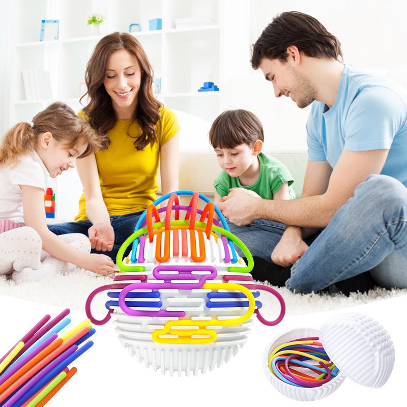 Family playing with colorful fidget sensory activity ball for stress relief and cognitive development