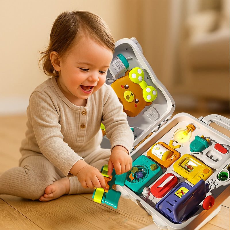 Toddler playing with a Busy Board Montessori educational toy for infants with lights, buttons, and interactive elements.