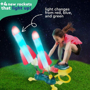 Child playing with Dual Toy Rocket Launcher, colorful light-up rockets blasting off outdoors, active fun for kids aged 4+