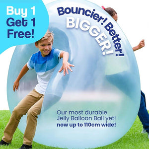 Kids playing outdoors with Giant Jelly Balloon Ball inflatable toy on grass, blue and white transparent balloon ball