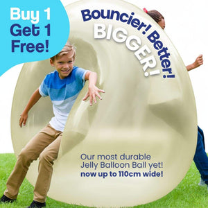 Kids playing with giant jelly balloon ball outdoors, inflatable durable outdoor toy