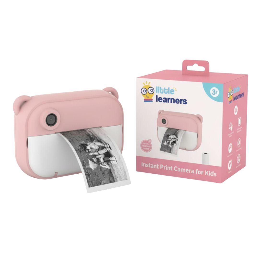 Pink kids instant print camera with bear ears and black-and-white photo printout, packaged box included, suitable for ages 3 and up.