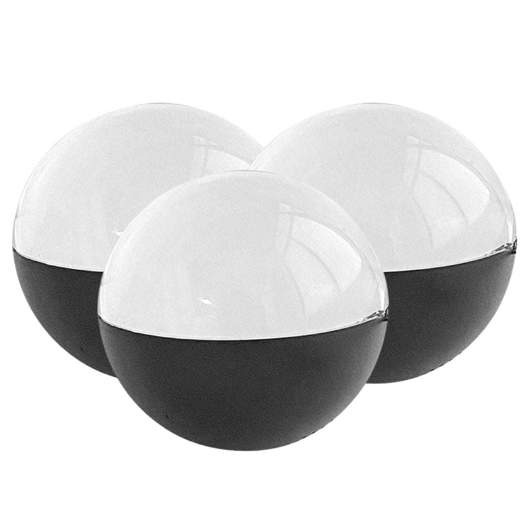 3D holographic video memory ball on charging base displaying glowing Christmas tree ball decoration