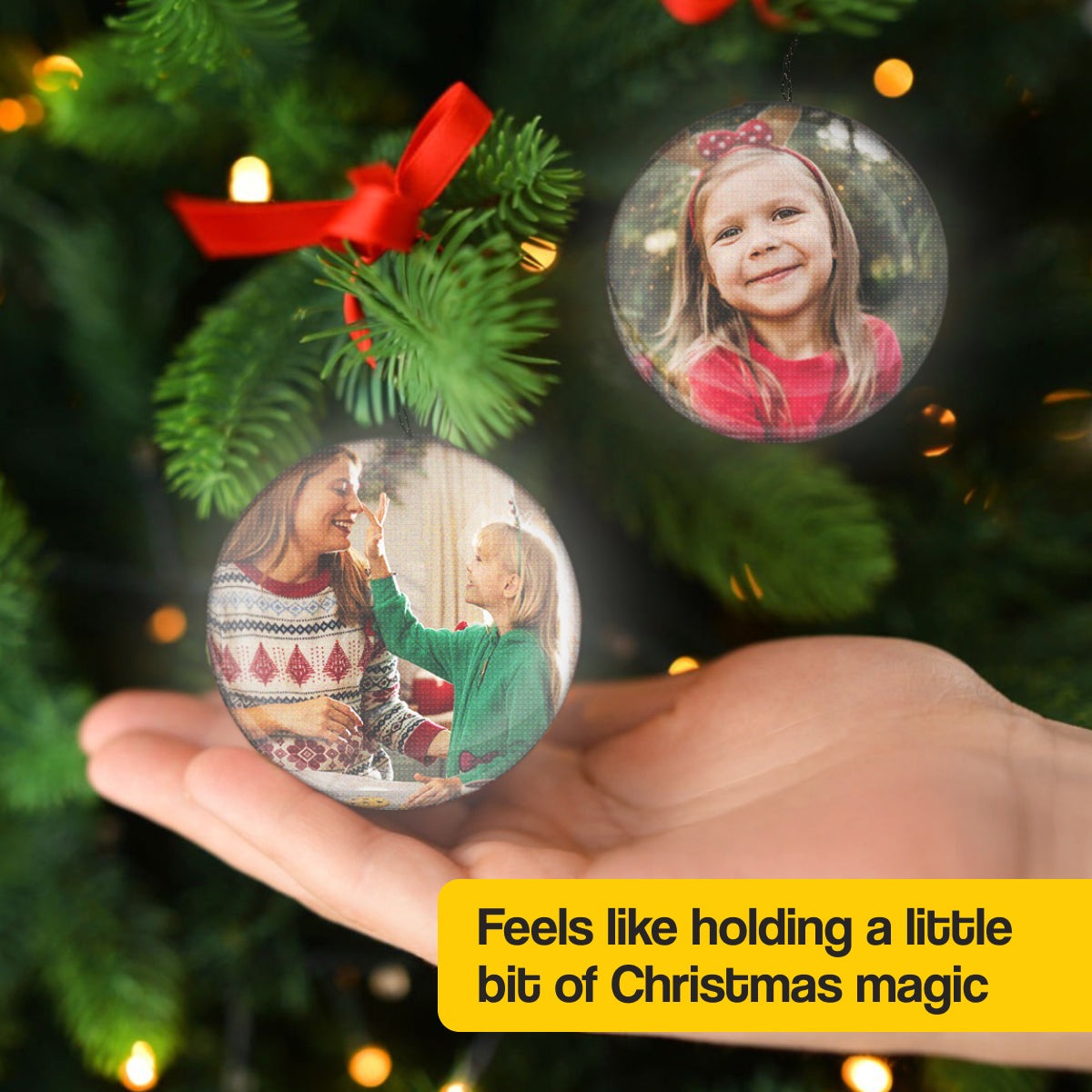 Video memory Christmas tree ornaments displaying 3D holographic family and child videos floating inside crystal spheres hanging on a festive tree with red ribbons.